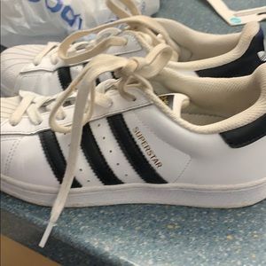 Black and white adidas shoes